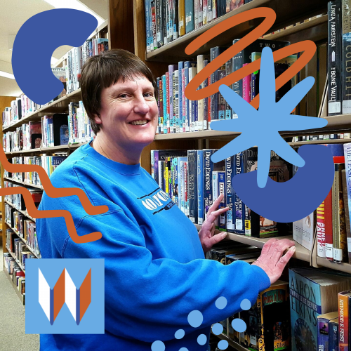 Colton Library Branch Manager, Holly, Stands Among Books And Cheery Orange And Blue Doodles.